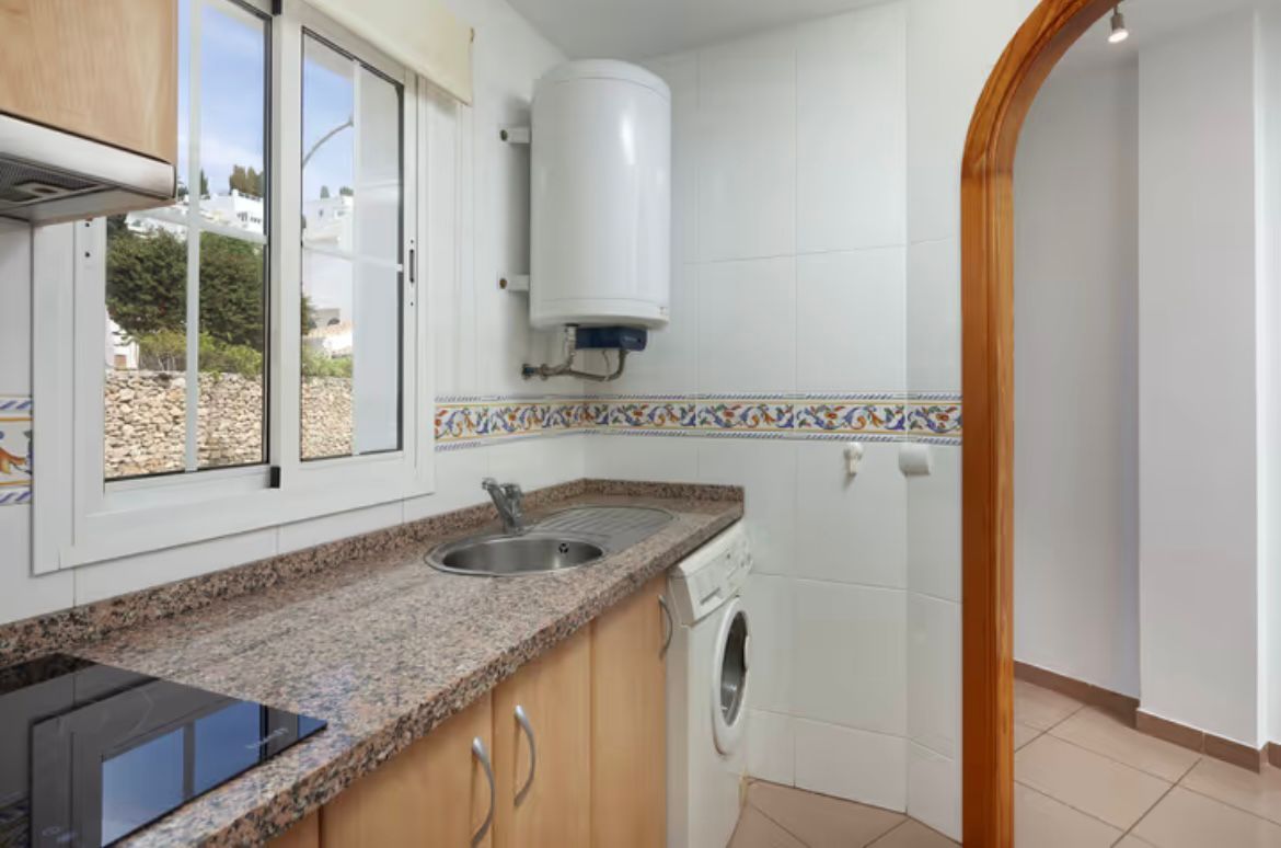 A beautifully presented one-bedroom apartment just meters from the famous Burriana Beach in Nerja.